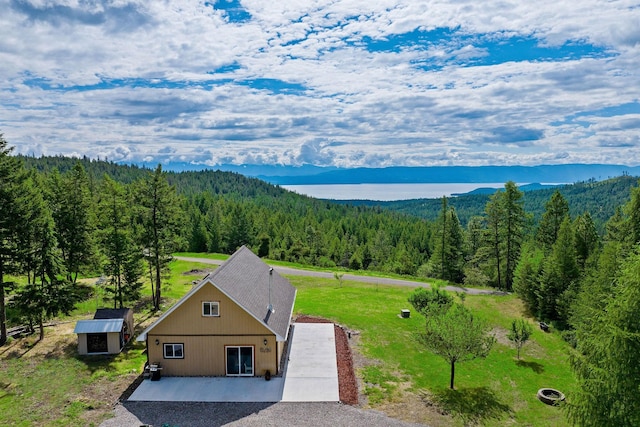 birds eye view of property with a mountain view