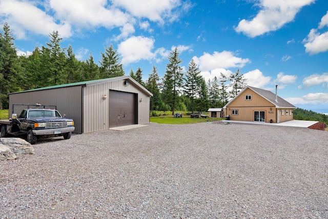 view of outdoor structure with a garage