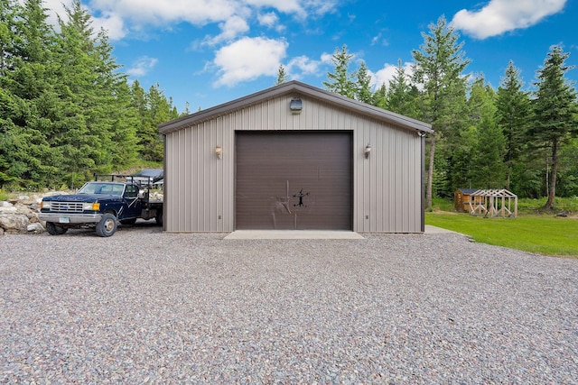 view of outbuilding featuring a garage