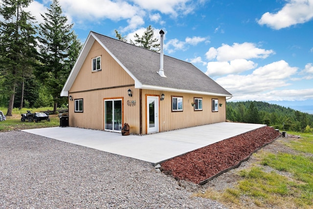 rear view of house featuring a patio area