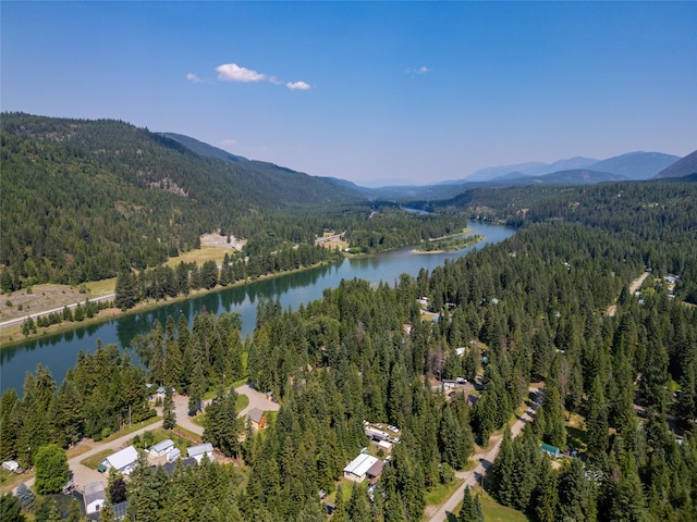 aerial view featuring a water and mountain view