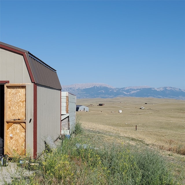 exterior space with a rural view