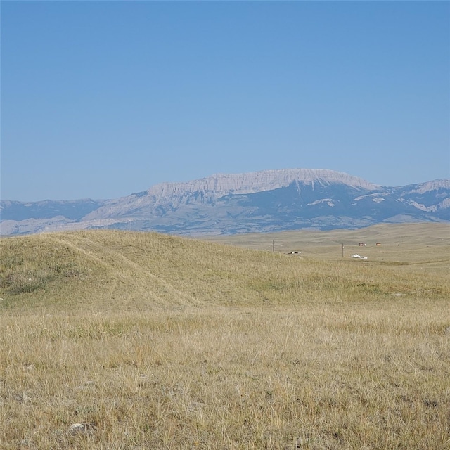 view of mountain feature with a rural view