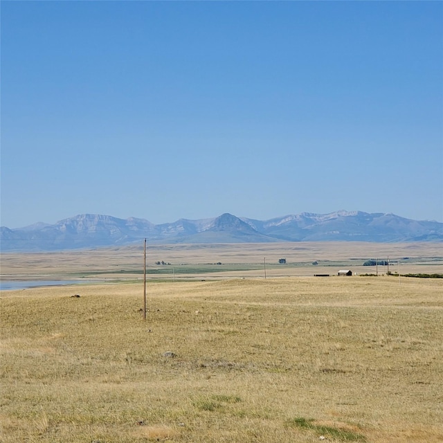 view of mountain feature featuring a rural view