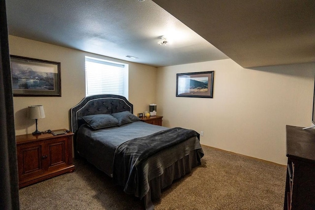 bedroom with carpet floors and baseboards