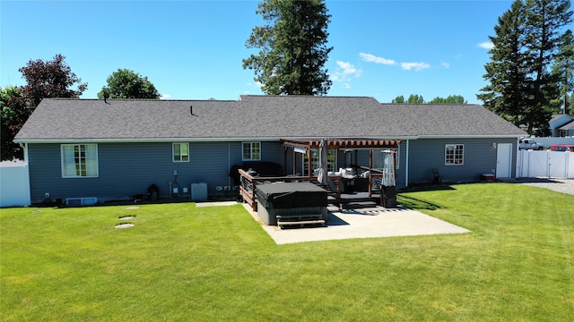 700 Stone St, Kalispell, MT 59901 - back of house featuring a pergola, a patio area, central AC unit, a gate, and a shingled roof