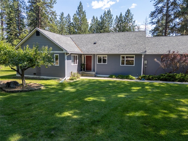 view of front of home with a front lawn