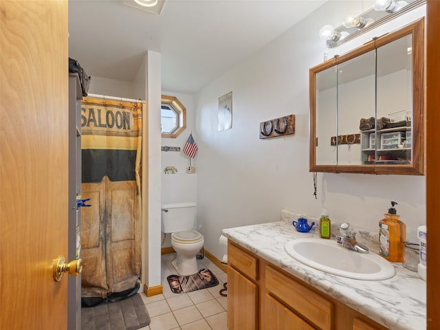 bathroom featuring a shower with shower curtain, vanity, toilet, and tile patterned floors