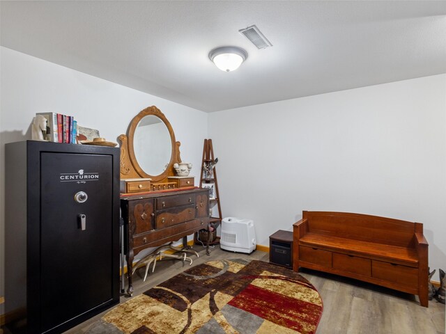 interior space with hardwood / wood-style floors