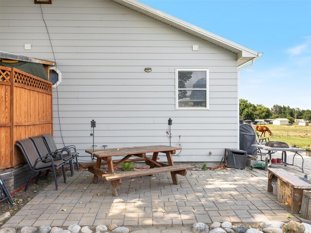 rear view of house featuring a patio