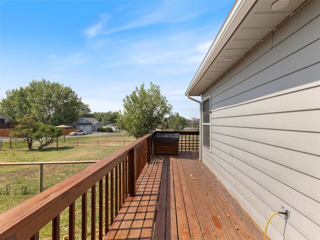 wooden deck with a yard