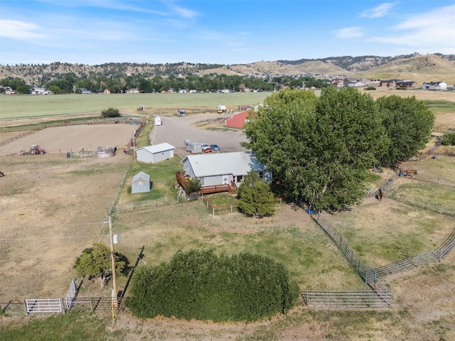 bird's eye view featuring a mountain view and a rural view