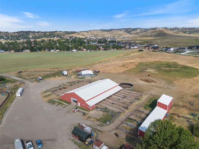 aerial view featuring a mountain view and a rural view