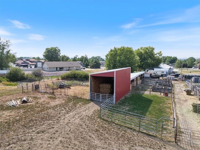 view of outbuilding featuring a rural view