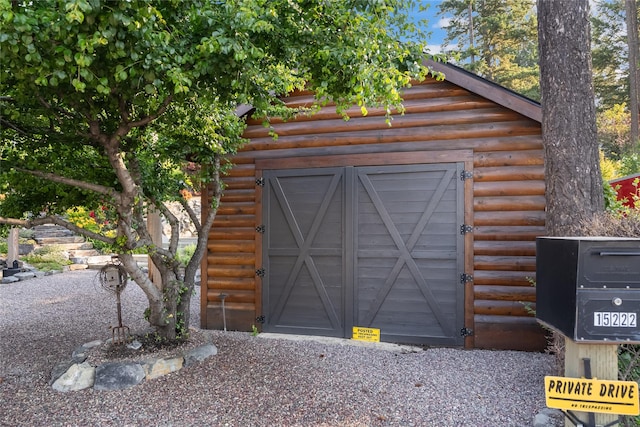 view of outbuilding with a garage