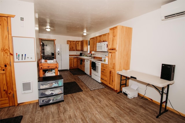 kitchen featuring white appliances, dark hardwood / wood-style floors, an AC wall unit, and sink