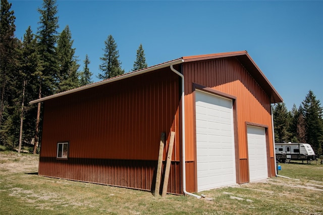 view of outbuilding with a garage