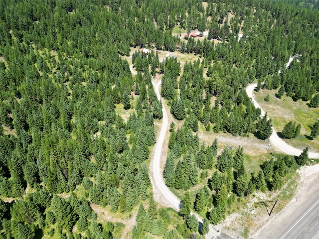 7957 US Highway 2 W, Kila, MT 59920 - aerial overview of property's location with a heavily wooded area