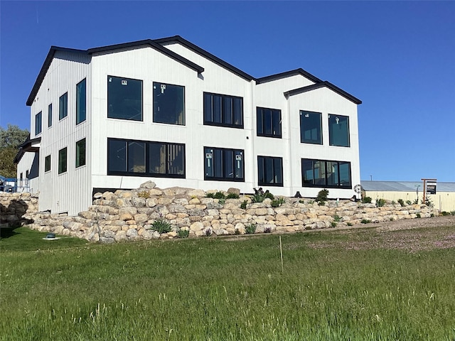 229 Shawnee Ln, Polson, MT 59860 - view of property exterior with a yard