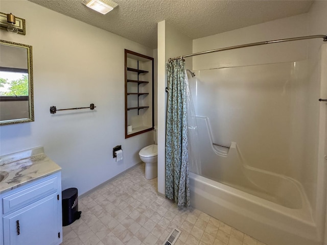 full bath with toilet, a textured ceiling, vanity, and visible vents