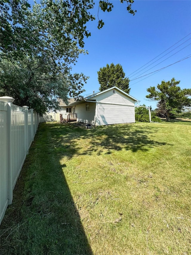 view of yard with fence