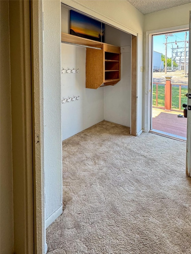 interior space with a textured ceiling