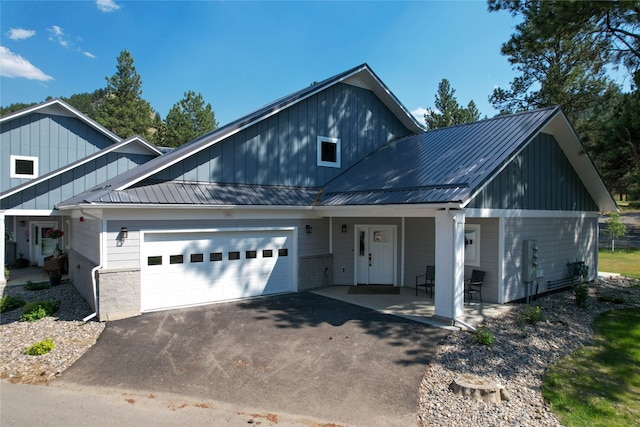 view of front of home with a garage