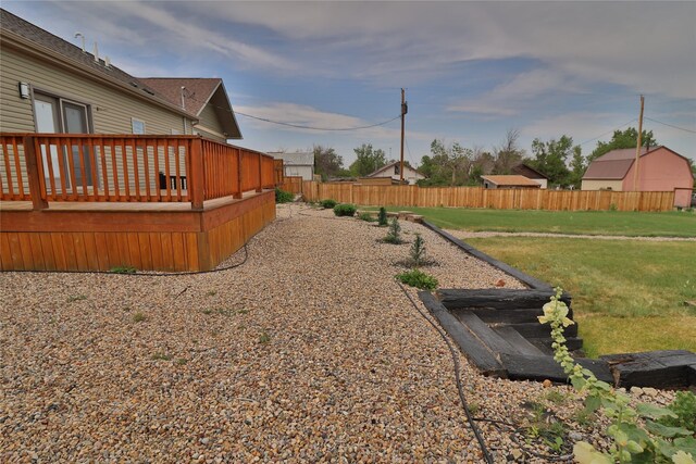 view of yard with a deck