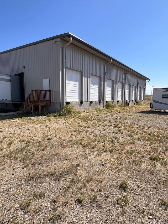 view of outdoor structure featuring an outdoor structure and community garages