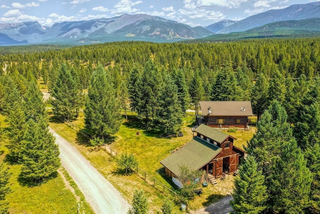 87 Badger Trl, Eureka, MT 59917 - view from above of property with a forest and a mountain backdrop