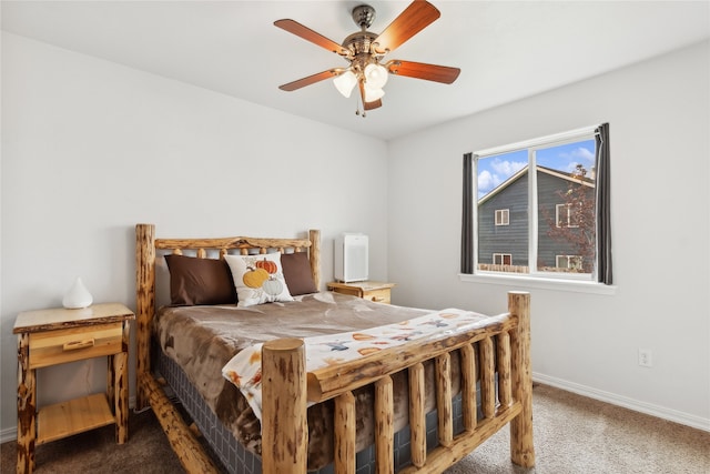 bedroom with ceiling fan and carpet