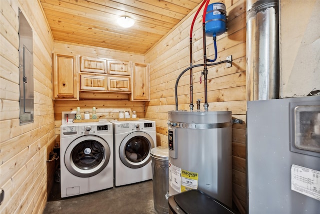 laundry area with separate washer and dryer, cabinets, secured water heater, wooden walls, and wooden ceiling