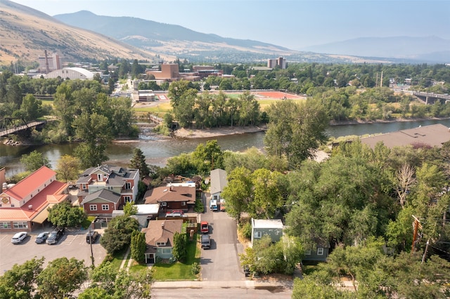 bird's eye view featuring a water and mountain view