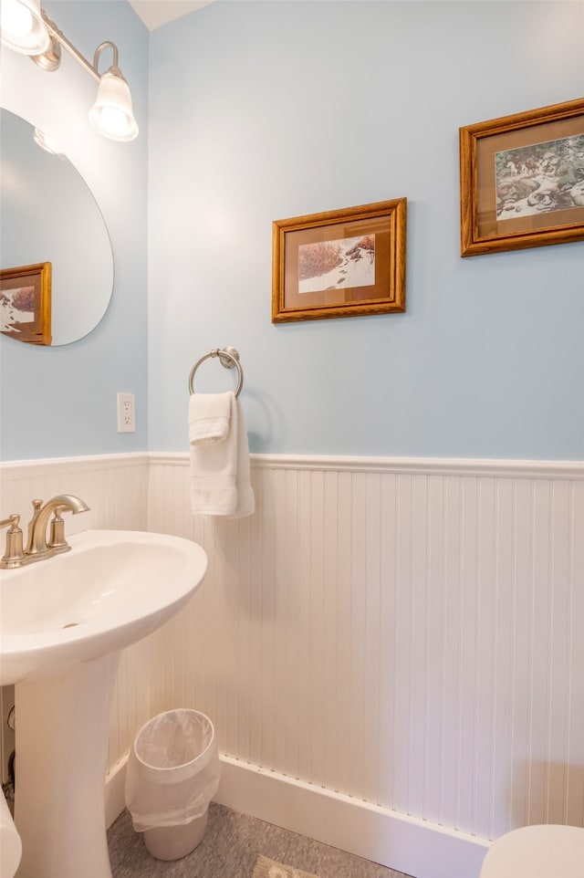 bathroom with sink and tile patterned flooring