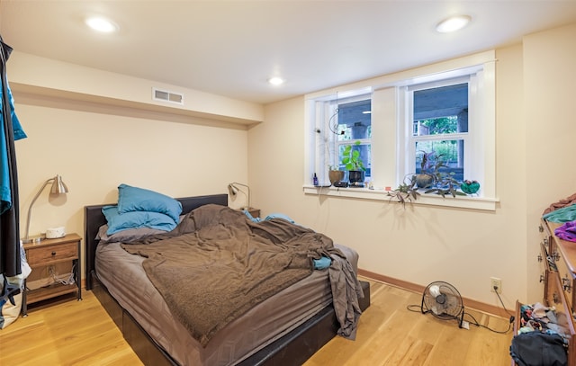 bedroom featuring light wood-type flooring