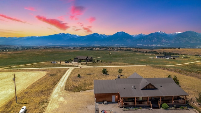 exterior space featuring a rural view and a mountain view