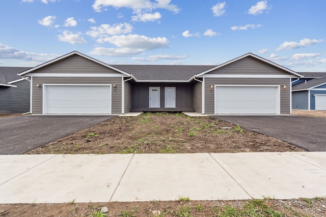 ranch-style house featuring a garage