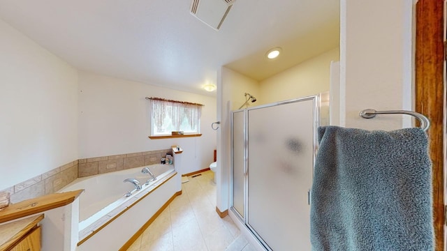 bathroom with shower with separate bathtub and toilet