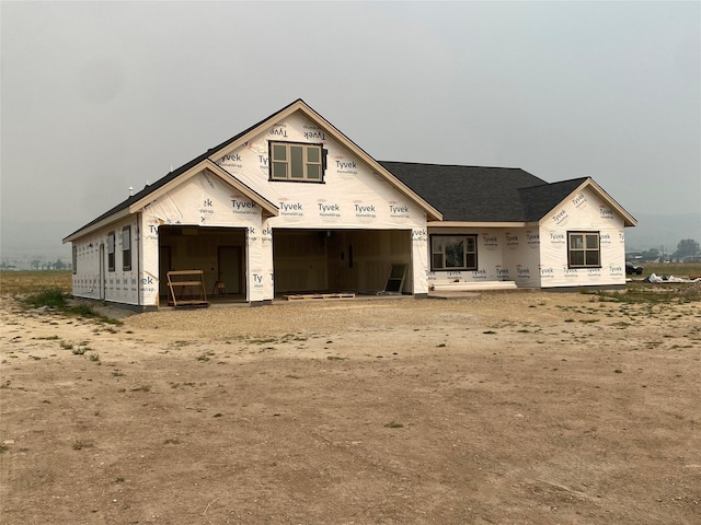 property in mid-construction featuring a garage