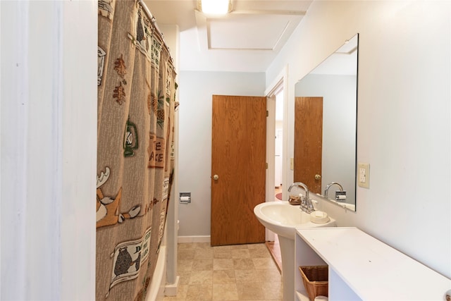 bathroom featuring tile patterned flooring