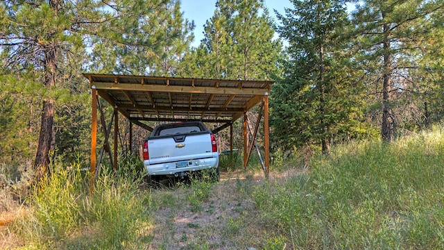 view of outbuilding with a carport