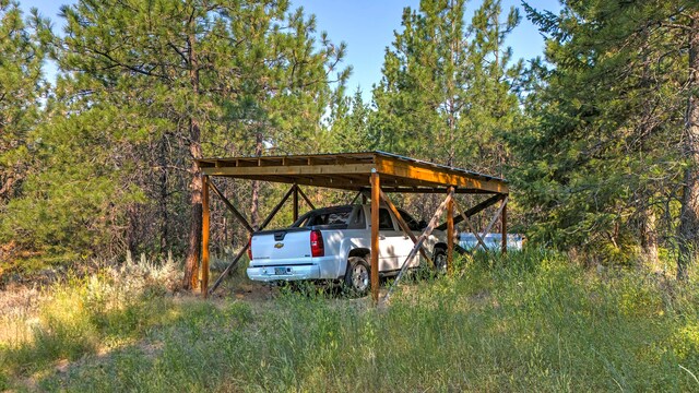 view of parking with a carport