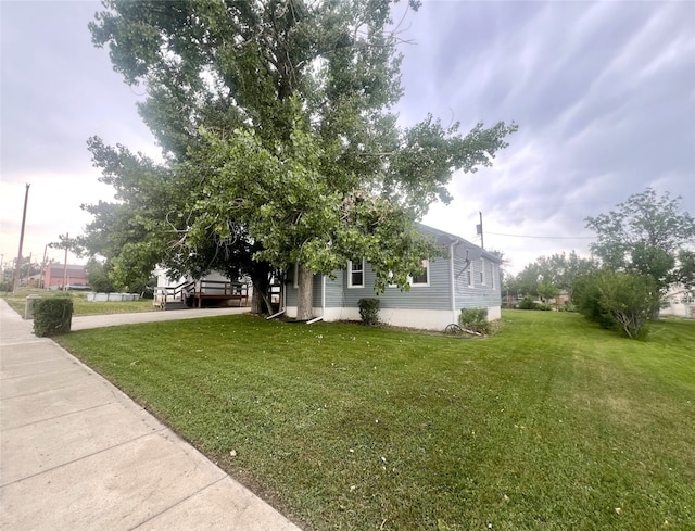 exterior space featuring a front lawn