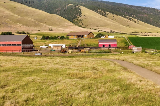 exterior space with a rural view