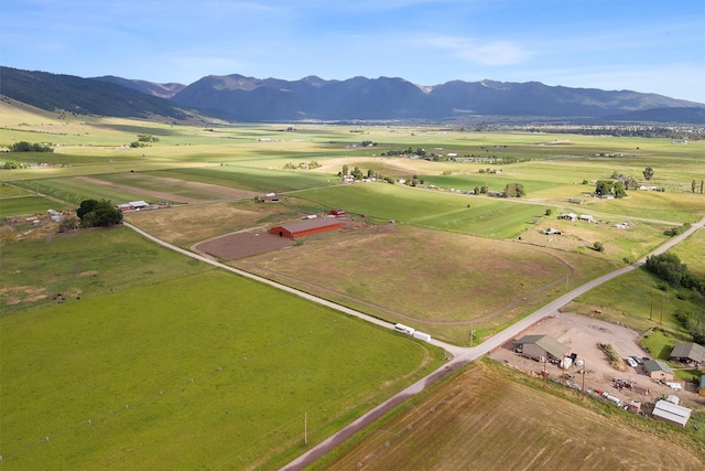 aerial view featuring a mountain view and a rural view