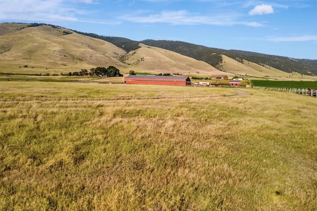 view of mountain feature featuring a rural view