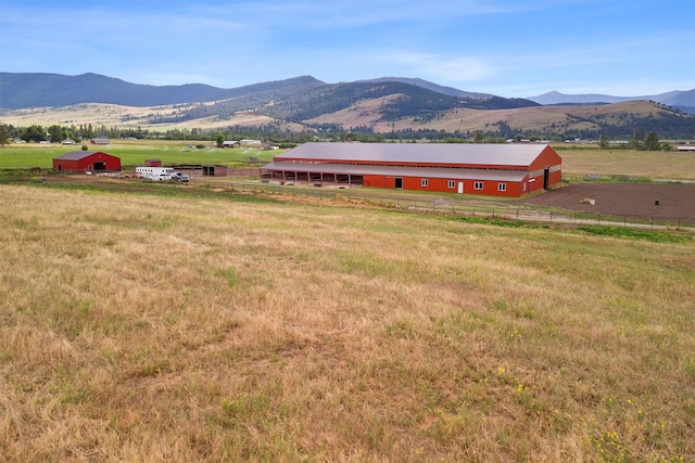 mountain view featuring a rural view