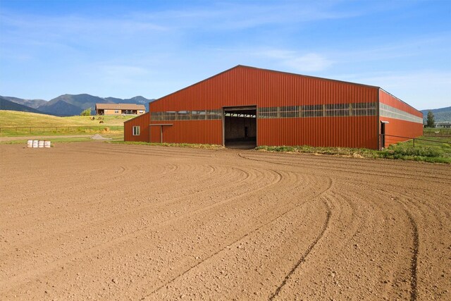 view of outdoor structure with a mountain view