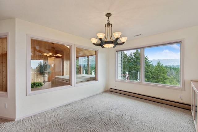 unfurnished room featuring carpet floors, a notable chandelier, a baseboard radiator, visible vents, and baseboards