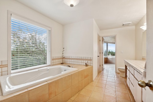 253 Pine Needle Ln, Bigfork, MT 59911 - full bathroom featuring a bath, vanity, and tile patterned floors